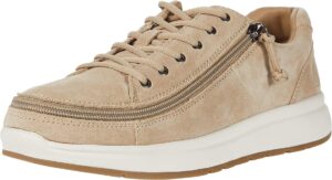 Tan suede shoes with a tied shoelace and a zipper for easier access to slip the shoe on and off.