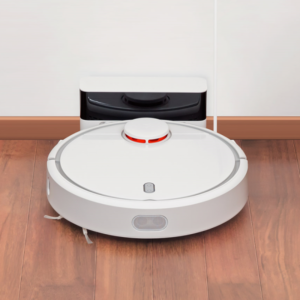 White Robot Vacuum Cleaner on a hardwood floor